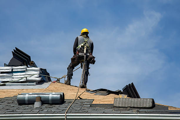 Professional Roofing technician working in Oxford, KS